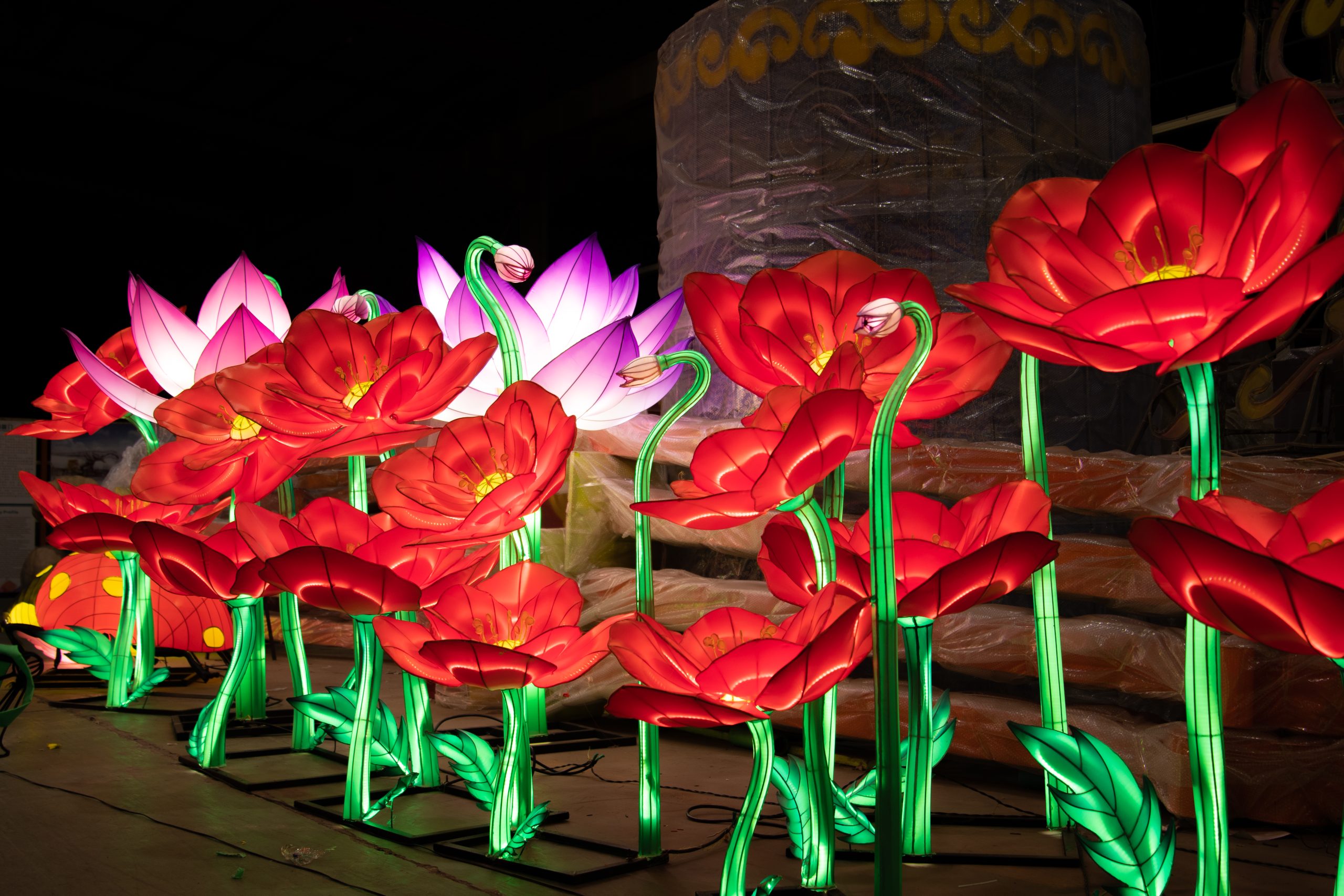 Group of red and pink flower lanterns in the workshop